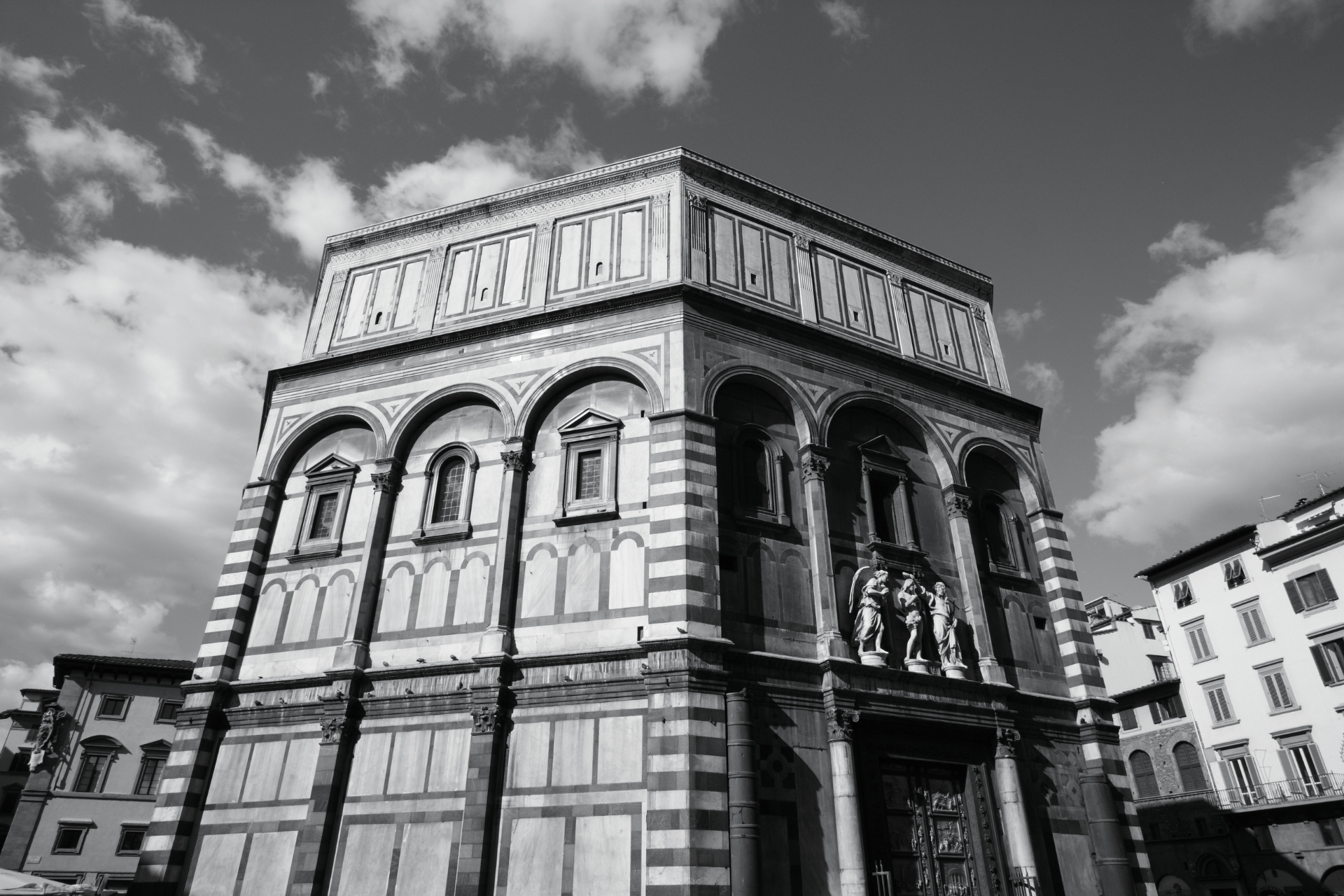 A Brief History of Art Competitions. A black and white photo of the Florence Baptistery in Florence, Italy)